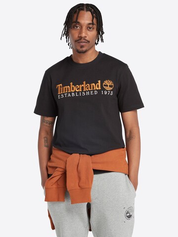 TIMBERLAND Majica | črna barva: sprednja stran