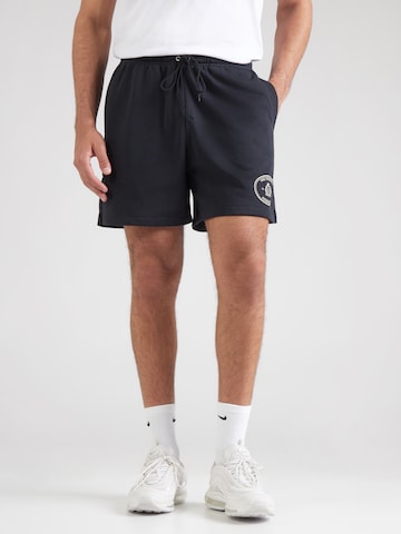 Loosefit Pantalon 'Club' Nike Sportswear en noir : devant
