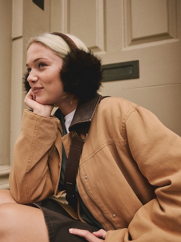 Cache-oreilles Next en marron