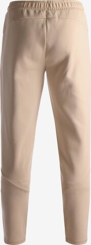 PUMA Slimfit Sportbroek in Beige