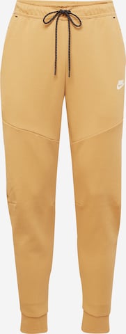 Nike Sportswear Pants in Beige: front