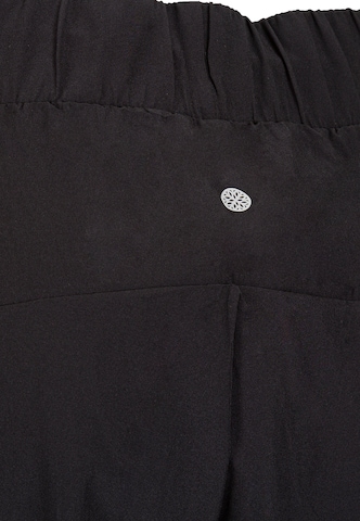 Athlecia - Tapered Pantalón deportivo 'Austberg' en negro