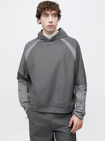 Nike Sportswear Szabványos Nadrág - szürke