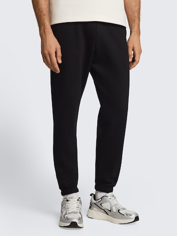 TOM TAILOR DENIM Tapered Trousers in Black: front