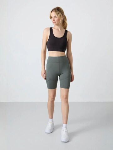 Tommy Life - Tapered Leggings 'Gamaschen' em verde