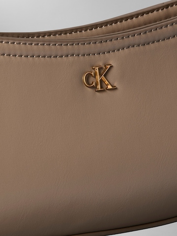 Calvin Klein Наплечная сумка в Коричневый