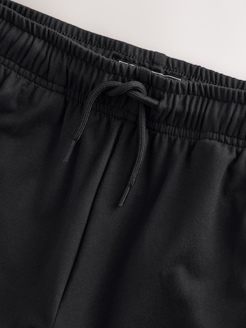 Next - regular Pantalón en negro