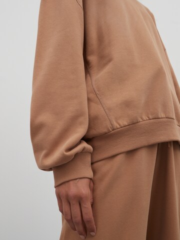 EDITEDSweater majica 'Lana' - smeđa boja