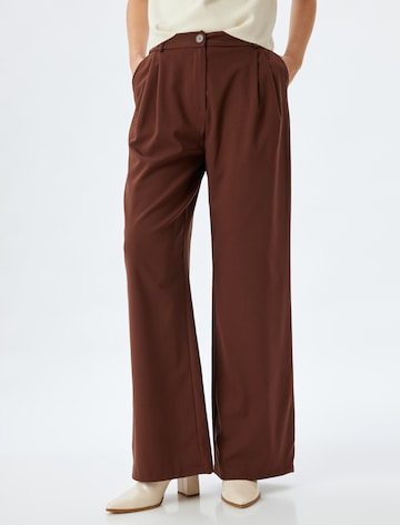 Koton Loose fit Pleat-front trousers in Brown: front