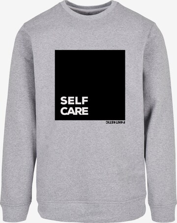 F4NT4STIC Sweatshirt 'SELF CARE' in Grau: predná strana