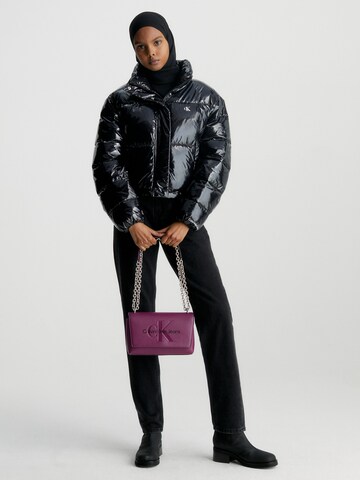 Calvin Klein Jeans Regular Crossbody Bag in Purple