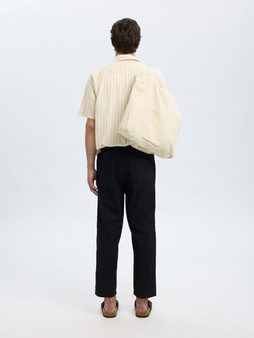 SELECTED HOMME Loose fit Trousers 'SLHMagnus' in Black