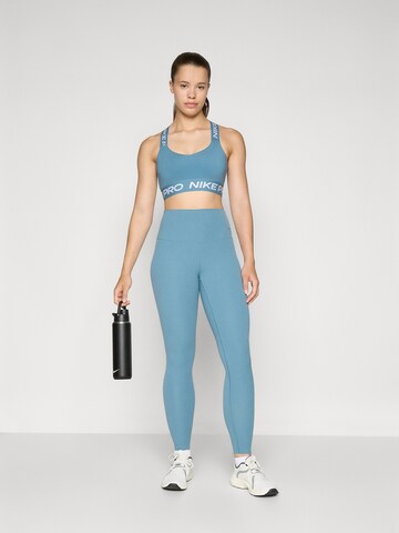 NIKE Μπουστάκι Αθλητικό σουτιέν σε μπλε