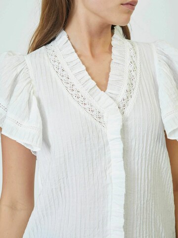 Chemisier 'Alisa' co'couture en blanc