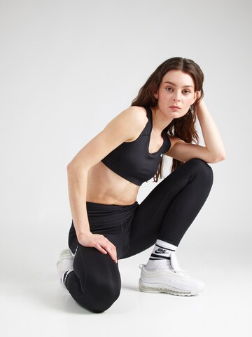 NIKE Skinny Sportbroek in Zwart