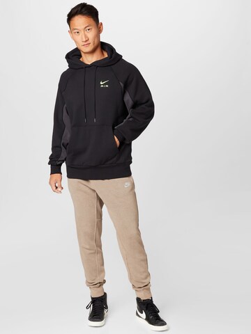 Nike Sportswear Tapered Broek in Groen