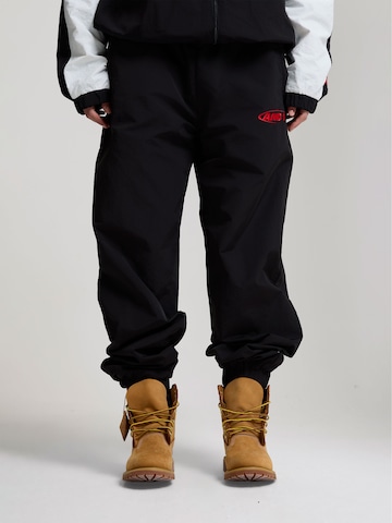 Effilé Pantalon AND1 en noir : devant