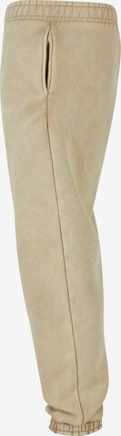 Tapered Pantaloni di Urban Classics in beige