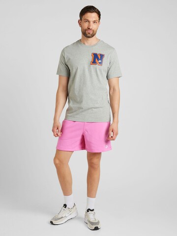 Nike Sportswear Loose fit Trousers 'CLUB' in Pink