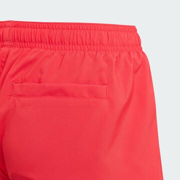 ADIDAS SPORTSWEAR Sportbadeshorts  'Essentials' in Rot