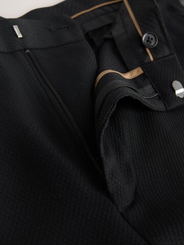 Next - regular Pantalón en negro