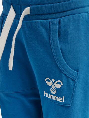 Effilé Pantalon Hummel en bleu