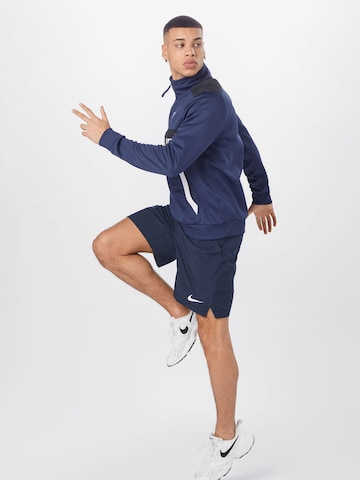 NIKE Regular Sportbroek 'FLEX' in Blauw