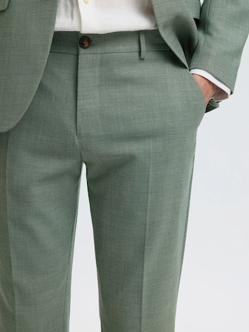 Slimfit Pantaloni '16087871' di SELECTED in verde