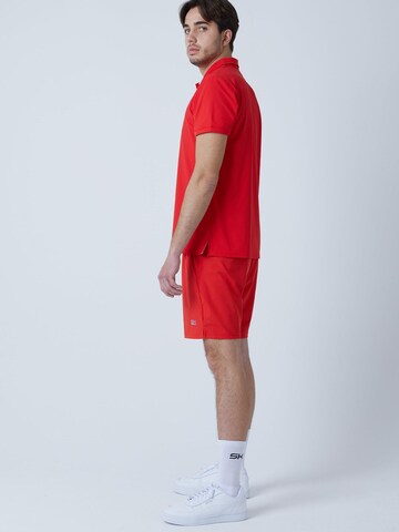T-Shirt fonctionnel 'Polo' SPORTKIND en rouge