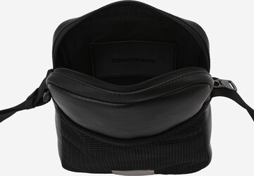 Sac à bandoulière Calvin Klein Jeans en noir