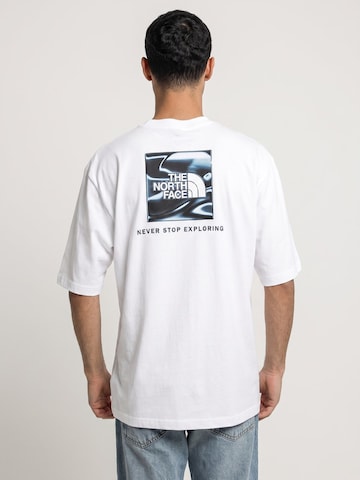 Maglietta 'M LQD BOX NSE OS SS TEE' di THE NORTH FACE in bianco