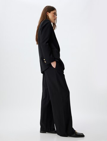Koton Wide leg Pleat-front trousers in Black