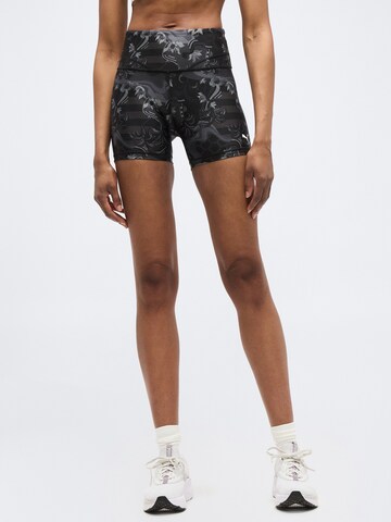 PUMA Skinny Urheiluhousut 'League' värissä musta: etupuoli