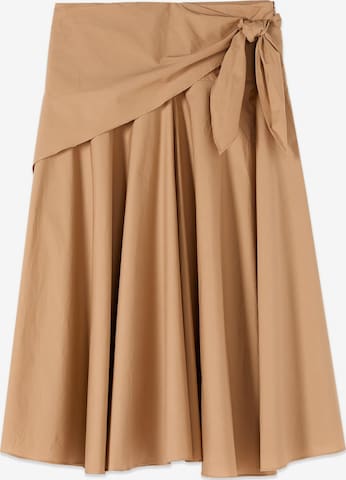 Gonna di oltre in beige: frontale