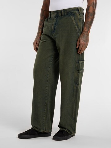DICKIES Baggy Jeans i grön