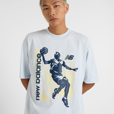 new balance T-Shirt en bleu marine / bleu clair / jaune, Vue avec produit