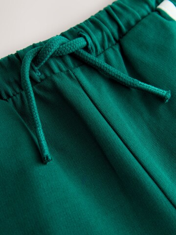 Next - Pierna ancha Pantalón en verde