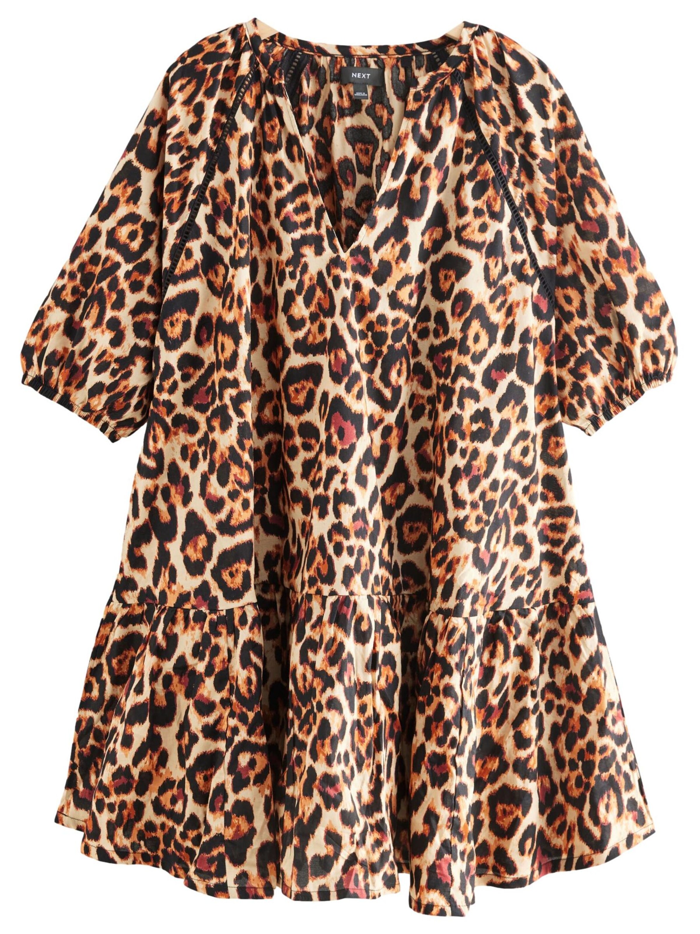 Next Pluus, värv pruun: eest vaates