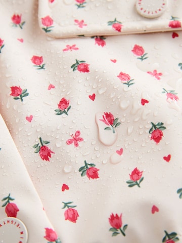 Palton de la Next pe bej