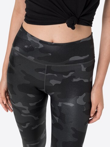 NIKE Skinny Sportbroek in Grijs