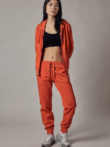 Felpa 'Felpa con Cappuccio e Zip' di OWN Off With Nature in arancione