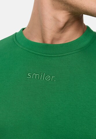 Sweat-shirt smiler. en vert