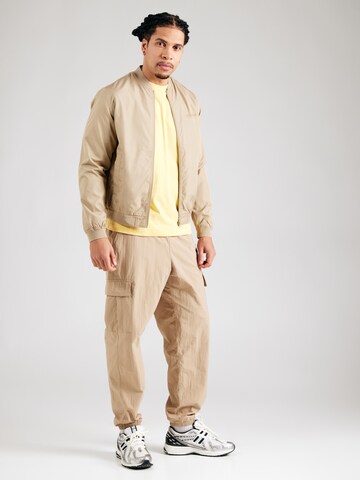 T-Shirt 'Essentials' new balance en jaune