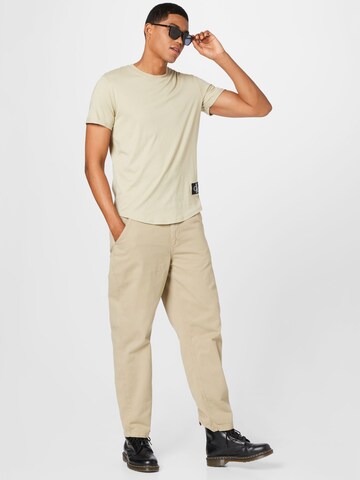 Tapered Pantaloni eleganți 'X-TRA SWARM CHINO' de la HOMEBOY pe bej