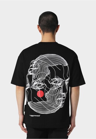 Irasuto Studios T-shirt 'Kao' i svart: framsida