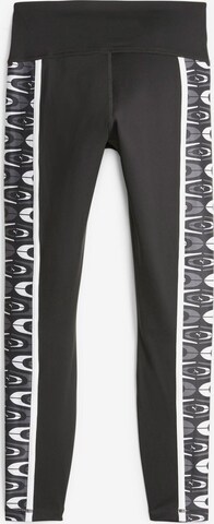 PUMA Skinny Sports trousers in Black