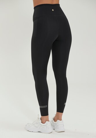 Athlecia Slim fit Workout Pants 'Douna' in Black