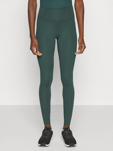 Girlfriend Collective Skinny Sportovní kalhoty ' Compressive ' – zelená: přední strana