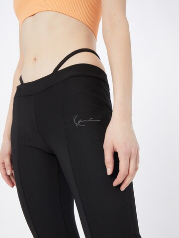 évasé Pantalon Karl Kani en noir