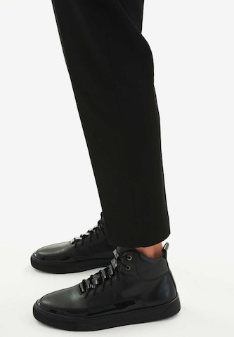 Kazar High-Top Sneakers in Black